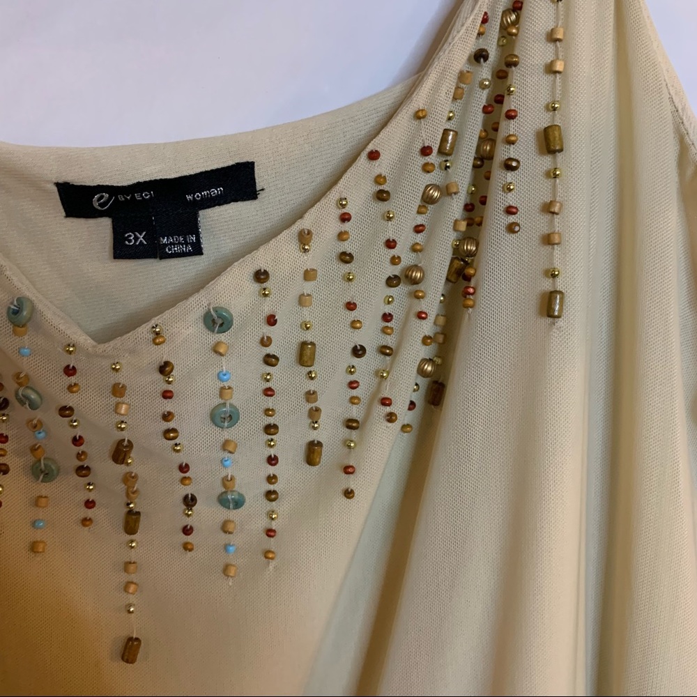 Cream colored Camisole with heavy beading